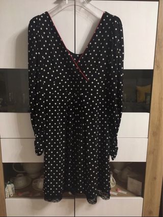 Abito pois nero con scollo a V