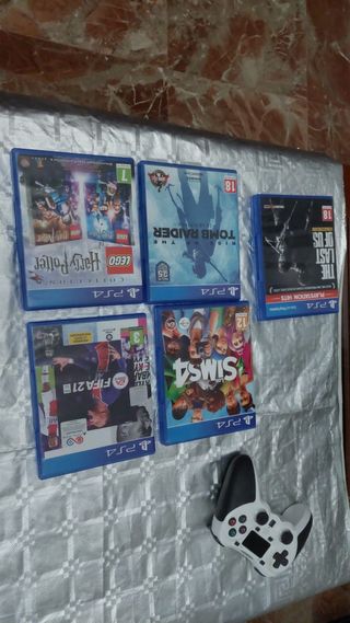 PS4 (PlayStation 4) Negra + juegos+ un mando extra