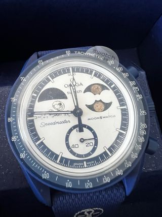 Omega Swatch Mission to Earthphase Moonshine Gold