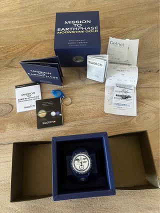 Omega Swatch Mission to Earthphase Moonshine Gold