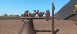 Campana decorativa con uccellini