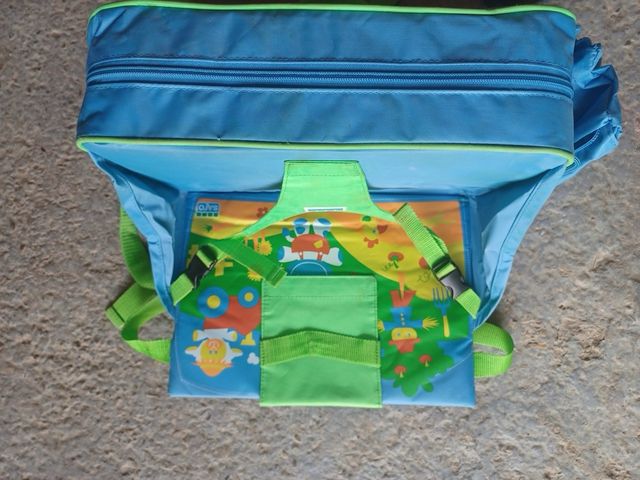 Asiento elevador infantil con diseño de granja