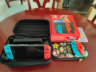 Nintendo Switch OLED + Mario Kart + Kit