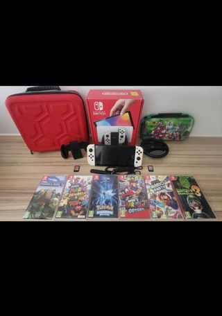 Nintendo Switch White OLED+8 Giochi e accessori