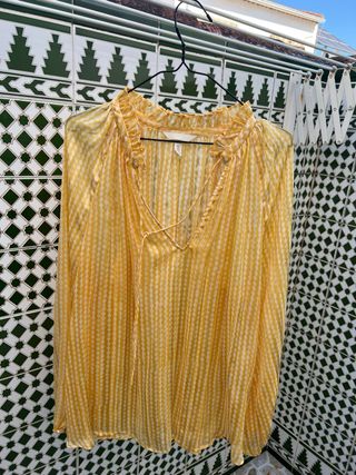 Blusa transparente amarilla