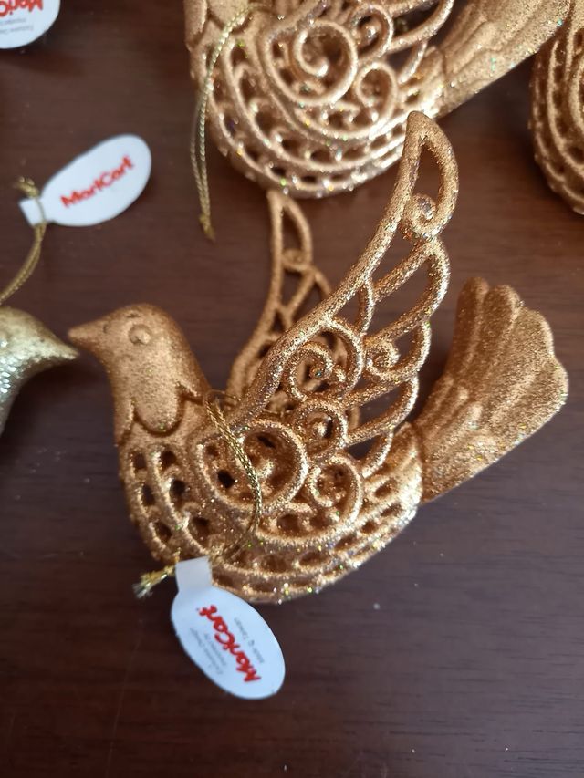 Uccellino decorativo dorato