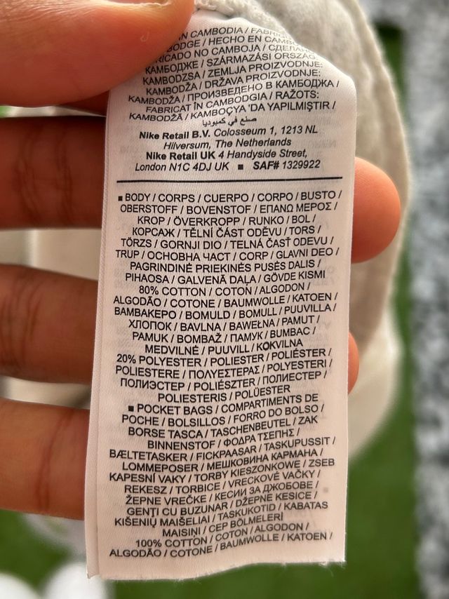 Pantalón corto Nike gris logo azul Talla L