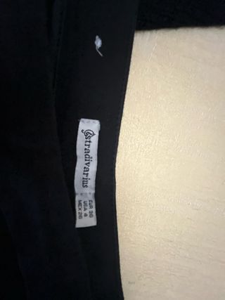 Pantalón Stradivarius negro con chaqueta de punto