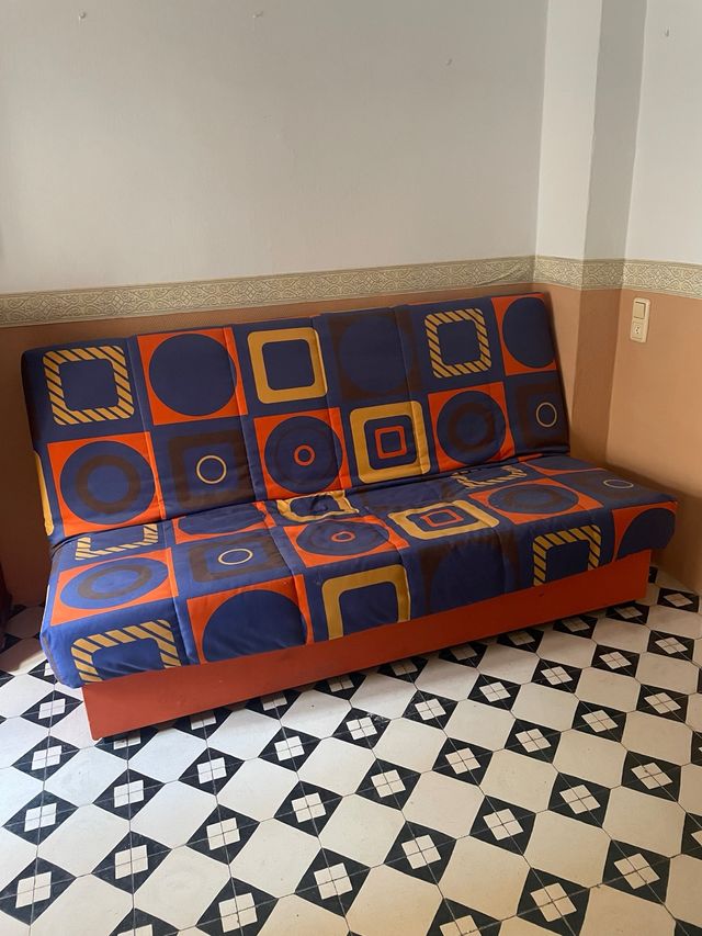 Sofá cama tela azul y naranja