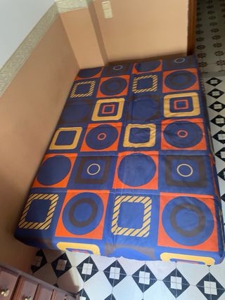 Sofá cama tela azul y naranja