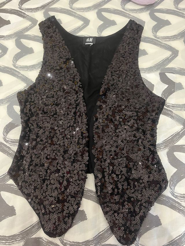 Chaleco lentejuelas.