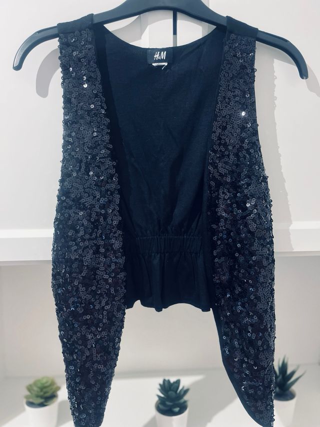 Chaleco lentejuelas.