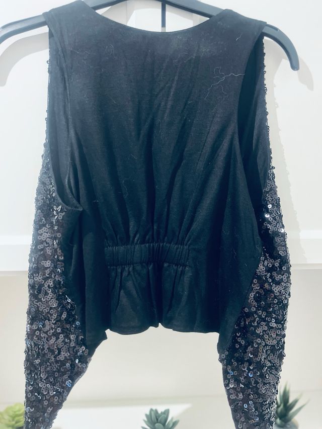 Chaleco lentejuelas.