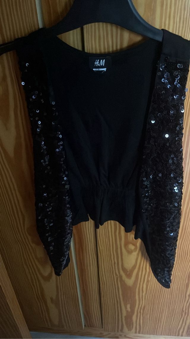 Chaleco lentejuelas.