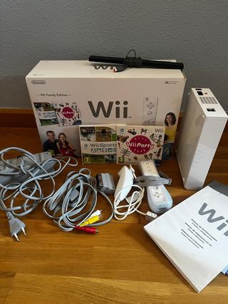 Nintendo Wii Family Edition con mando + 2 juegos