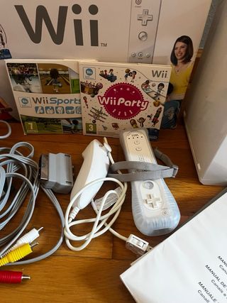 Nintendo Wii Family Edition con mando + 2 juegos