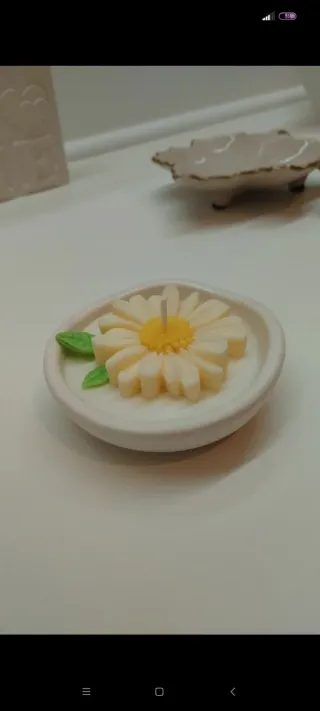 Candela a forma di margherita in vasetto 