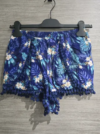 Shorts estampados con pompones