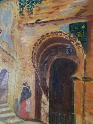 Cuadro al óleo con marco dorado.