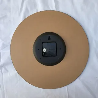 Reloj de pared decorativo con mariposa