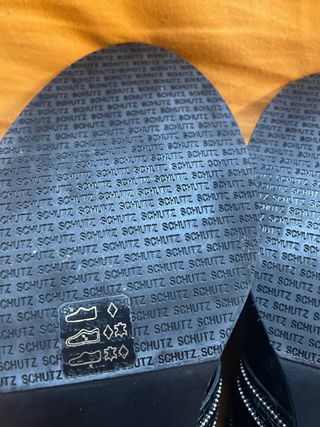 Stivaletti Schutz neri con fibbie