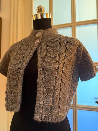 Bolero coprispalle collo alto grigio