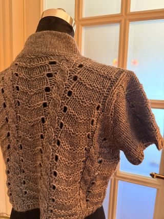 Bolero coprispalle collo alto grigio