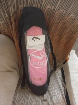 Skate rosa con funda