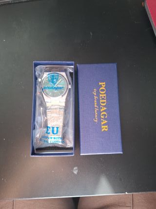 Reloj Poedagar Plateado con Esfera Verde Turquesa.