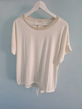 Blusa manga corta dorada y blanca