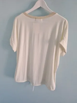 Blusa manga corta dorada y blanca