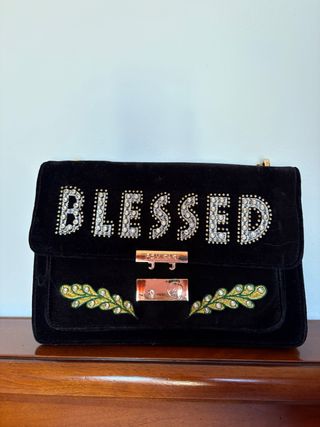 Borsa Pomikaki nera con strass e foglie