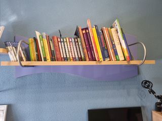 Habitación juvenil madera y azul