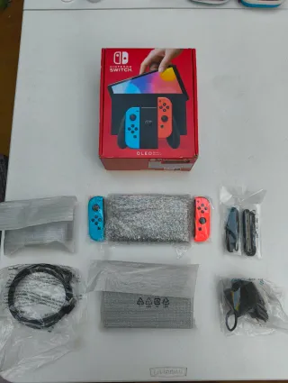 Nintendo Switch OLED Azul/Roja Impecable