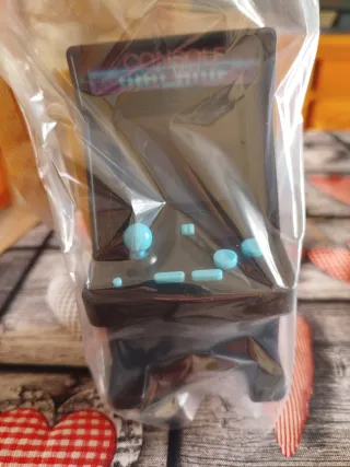 Mini consola arcade retro. De Colacao