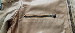 Chaqueta de piel marrón y beige