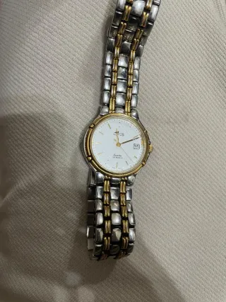 Reloj Lotus Oro y Plata