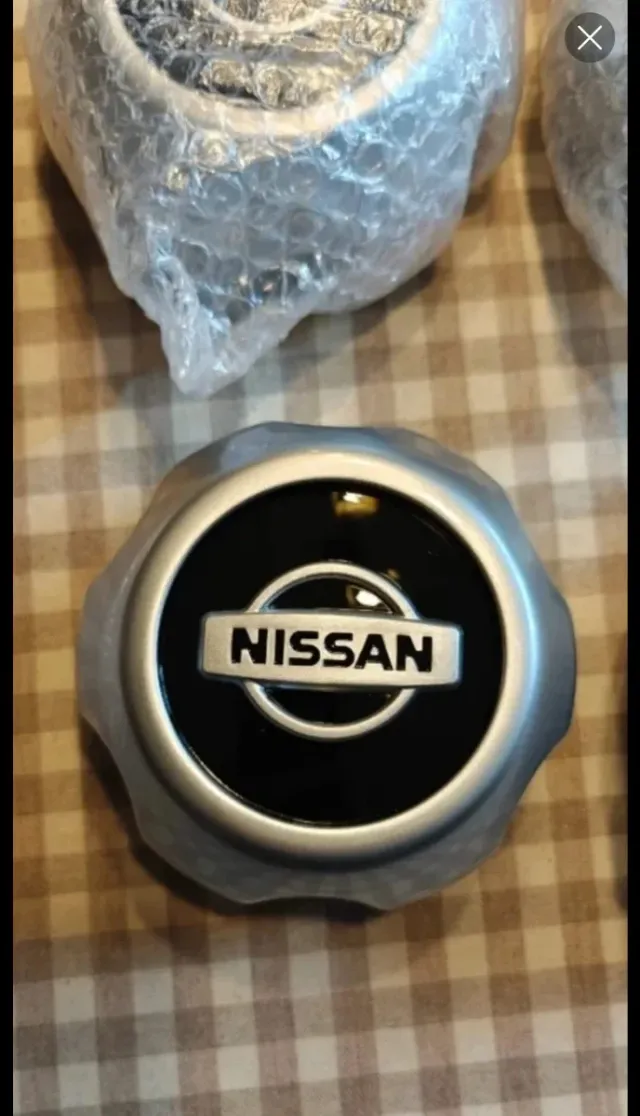 Tapacubos Nissan Terrano II