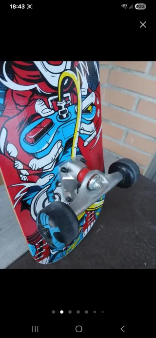Patinete Oxelo con diseño de mono
