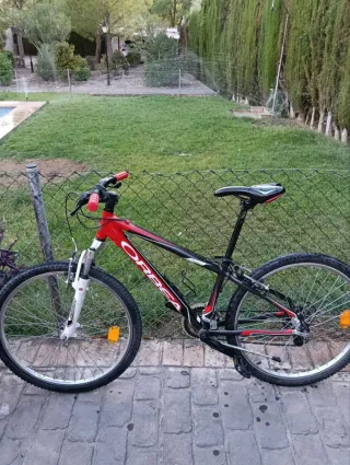 Bicicleta Montaña Orbea Roja y Negra