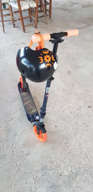 Patinete Scooter Oxelo MID 7 Niños Naranja Negro. 