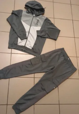 Tuta Nike uomo grigio/bianco S/xs acetata