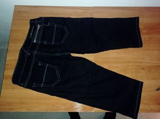 PANTALÓN MUJER . POR DEBAJO DE LAS RODILLAS