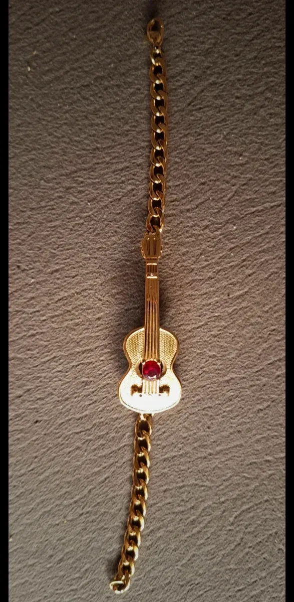 Plusera  esclava Guitarra