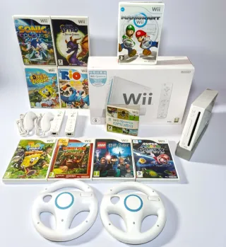 Wii pack + Mandos + juegos + volantes 