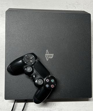 PS4  Pro Negra 1tera+ Mando + Juego Horizon Zero