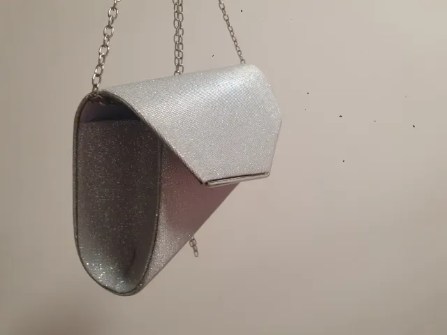 Bolso de fiesta plateado sin usar. Negro o rosa