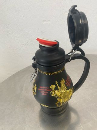 Jarra termo negra con diseño dorado