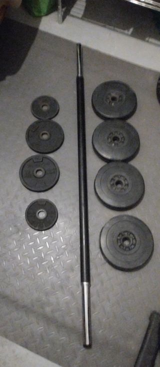 Barra de pesas y discos