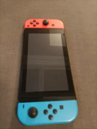 Nintendo Switch con 2 mandos extra
